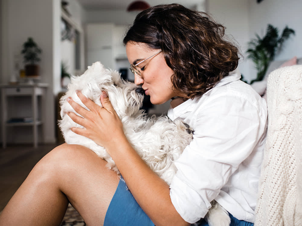 That Urge to Squeeze Your Dog Is Your Brain Hitting the Brakes
